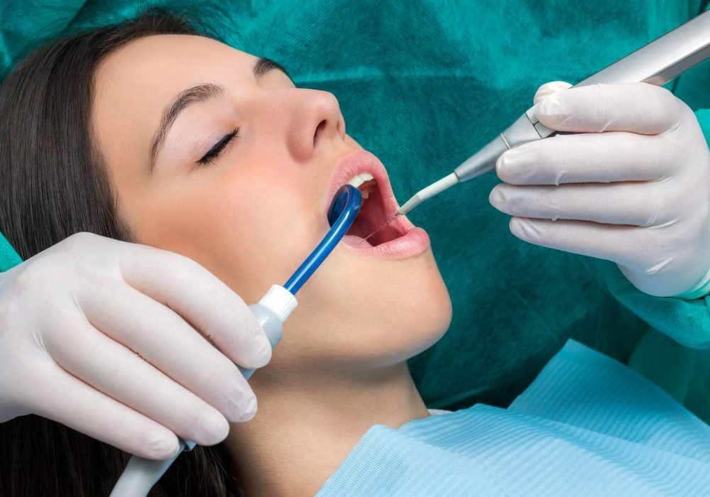 Dr. Rasha do a dental filling